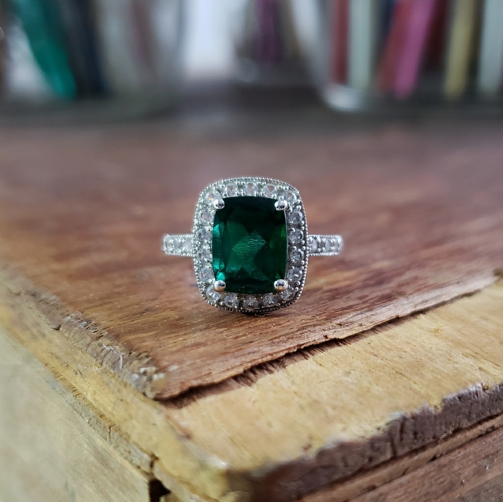 14k white gold 1/2 carat emerald ring